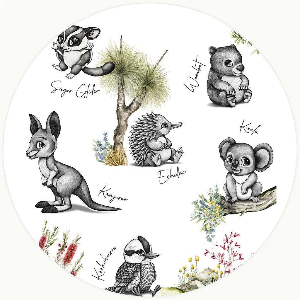 Australian animal nursery print featuring a sugar glider, koala, wombat, and kangaroo. The hand-drawn art uses a sophisticated black and white dot technique (stippling) accented with delicate watercolor flora and botanical elements.