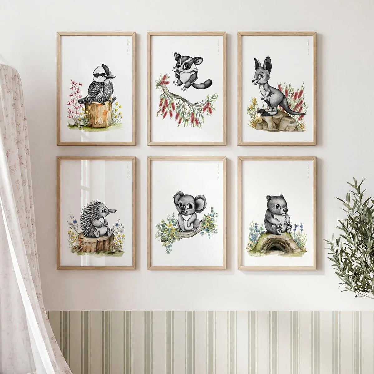 Gallery wall set of 6 Australian bush animal prints in matching light wood frames for a modern, nature-inspired nursery.