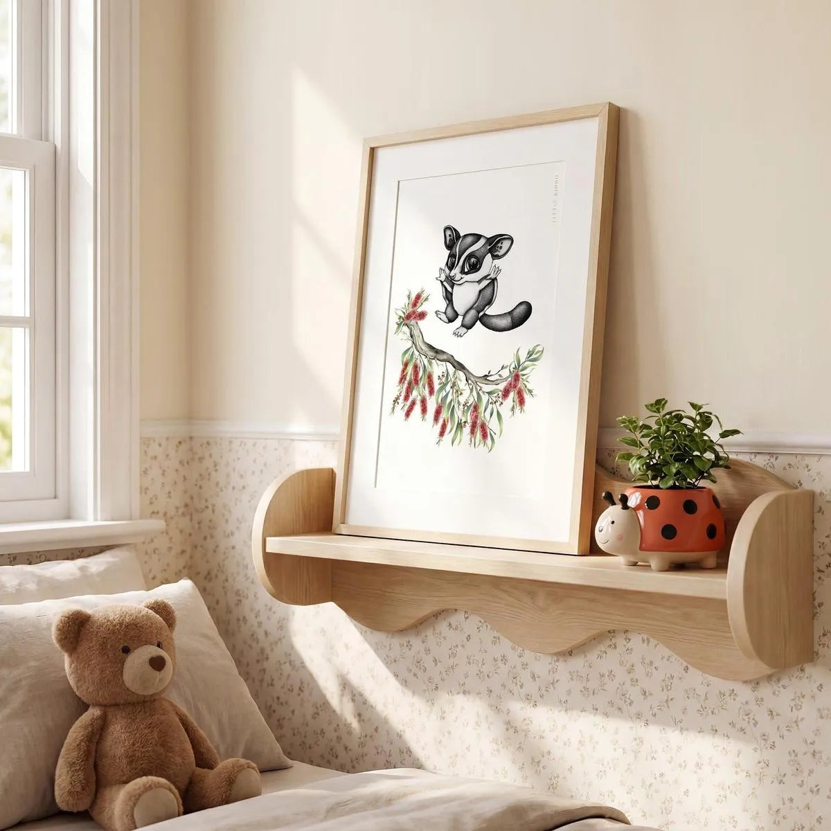 Framed sugar glider illustration on a wavy wooden nursery shelf, unique Australian wildlife bedroom decor and nursery styling.