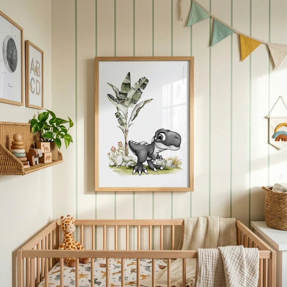 Minimalist T-Rex nursery print hanging above a wooden crib in a room with striped wallpaper and colorful fabric bunting.
