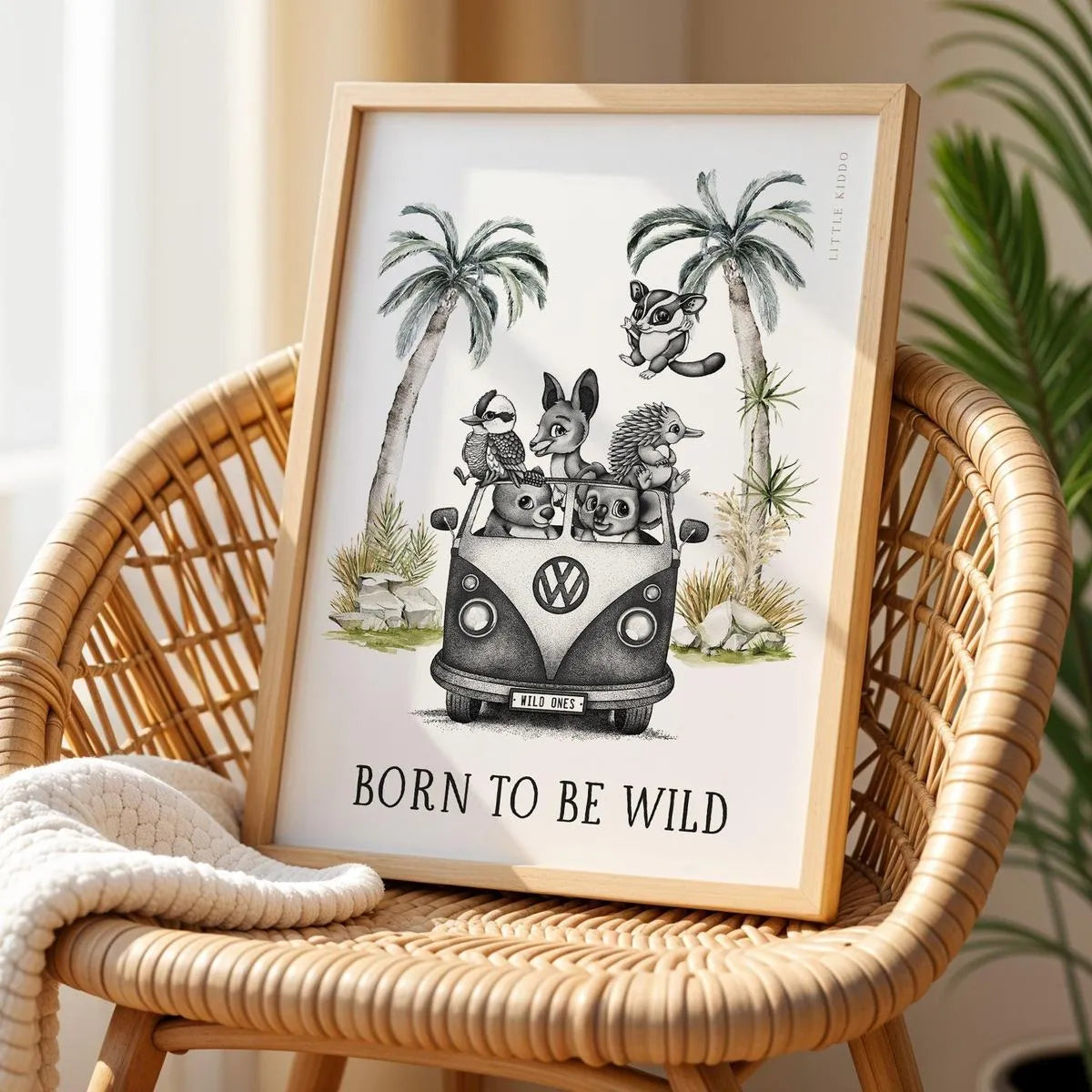 Australian bush animal surf van poster displayed on a rattan chair, perfect for a gender-neutral adventure nursery theme.
