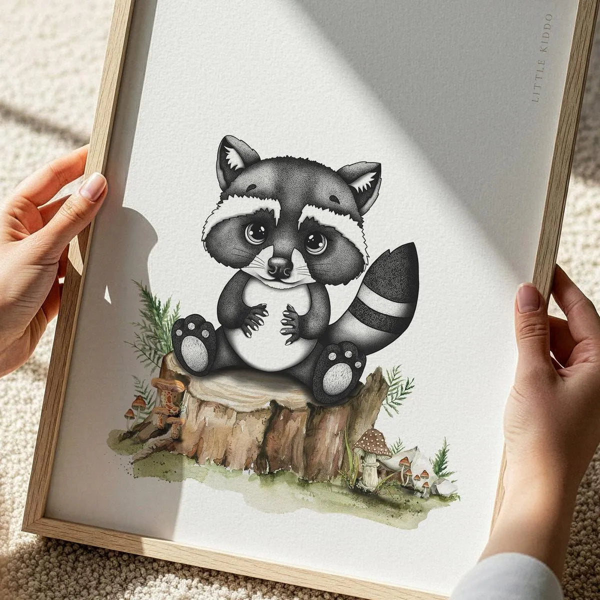 Close-up of a hand-inked raccoon illustration for kids, featuring detailed stippling and watercolor texture for a premium nursery look.