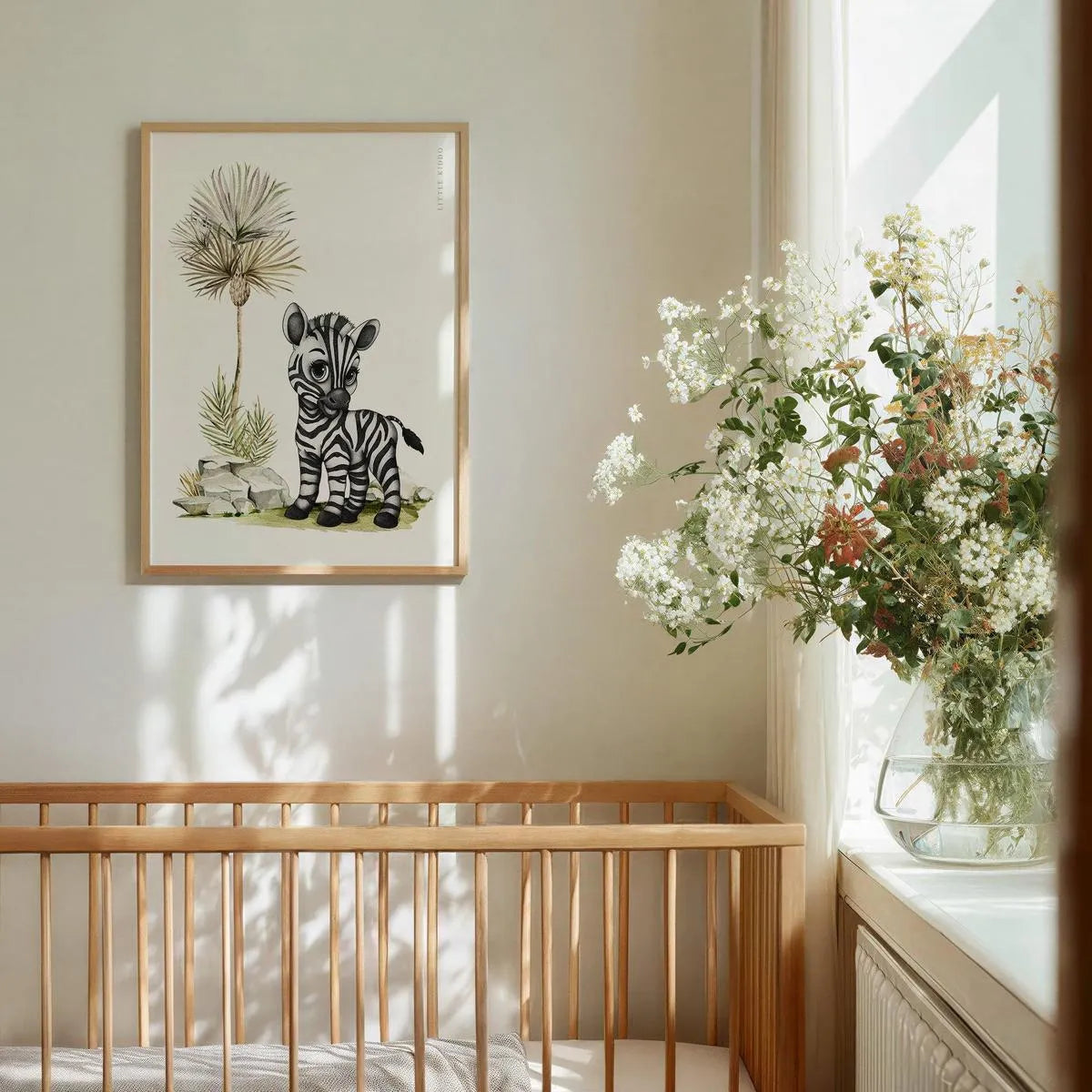Minimalist baby zebra art hanging above a wooden crib, gender-neutral safari animal wall decor for a sophisticated nursery.