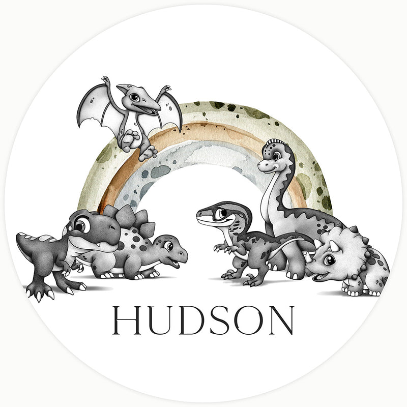 Personalised dinosaur nursery art for "Hudson" featuring a group of hand-drawn dinosaurs and a pterodactyl. The design includes a sophisticated earth-toned watercolor rainbow and detailed black and white stippled characters.