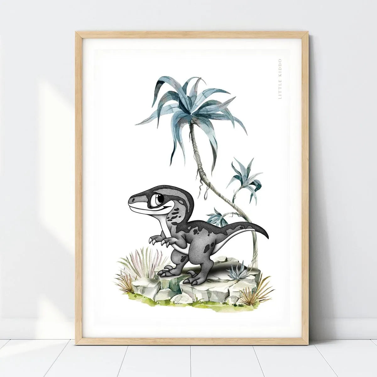Close-up of a sophisticated dinosaur nursery print. Hand-drawn using a professional black and white dot technique, featuring a baby dinosaur under blue watercolor tropical leaves on a clean white background.