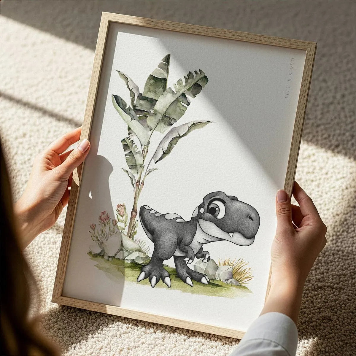 Close-up of a hand-inked Tyrannosaurus Rex illustration for a kids' room, featuring detailed stippling and soft green watercolor botanical elements.