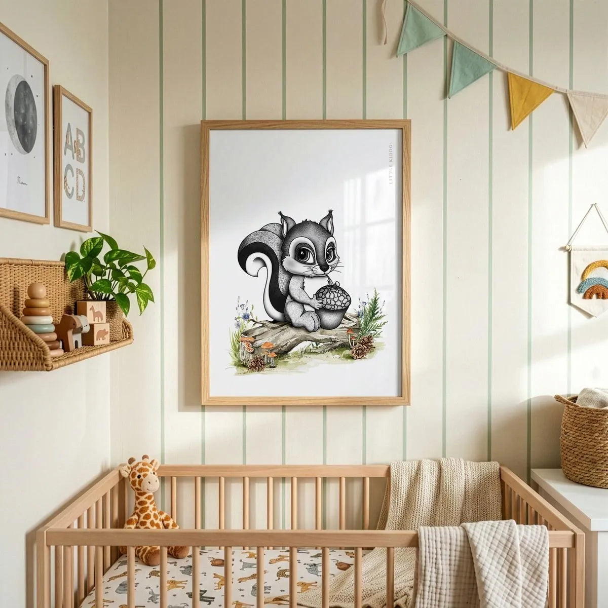 Whimsical squirrel nursery wall art hanging above a wooden baby crib in a modern room with striped wallpaper and colorful bunting.